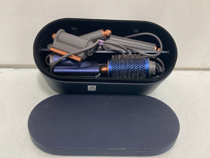 Lot 607  
            Marchington SR14 - Parcel Delivery Only 

                
DYSON AIR WRAP MULTI STYLER AND DRYER SET - ORIGINAL RRP £400: LOCATION - B13