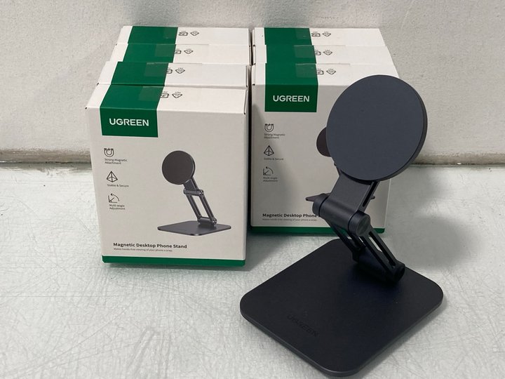 Lot 634  
            Marchington SR14 - Parcel Delivery Only 

                
8 X UGREEN MAGNETIC DESKTOP PHONE STANDS IN BLACK - COMBINED ORIGINAL RRP £159.92...