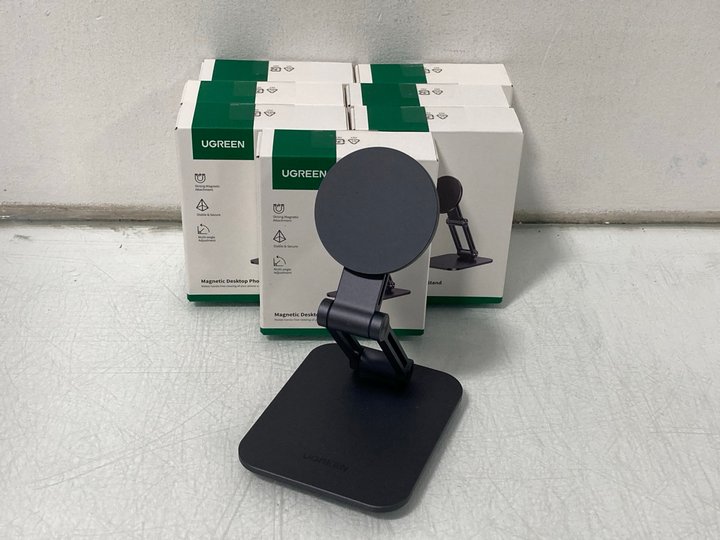 Lot 635  
            Marchington SR14 - Parcel Delivery Only 

                
8 X UGREEN MAGNETIC DESKTOP PHONE STANDS IN BLACK - COMBINED ORIGINAL RRP £159.92...