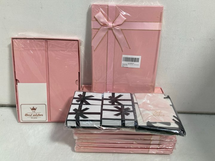 Lot 665  
            Marchington SR14 - Parcel Delivery Only 

                
QTY OF POP UP GIFT BOXES WITH LIDS AND RIBBONS IN PINK: LOCATION - B10