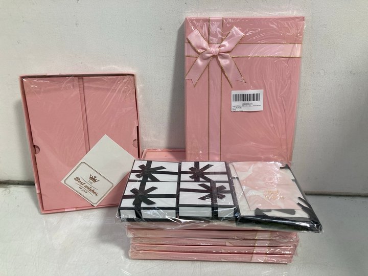 Lot 666  
            Marchington SR14 - Parcel Delivery Only 

                
QTY OF POP UP GIFT BOXES WITH LIDS AND RIBBONS IN PINK: LOCATION - B10