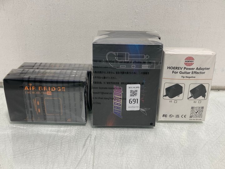 Lot 691  
            Marchington SR14 - Parcel Delivery Only 

                
5 X ASSORTED TECH ITEMS TO INCLUDE HOEREV POWER ADAPTER FOR GUITAR EFFECTOR: LOCA...