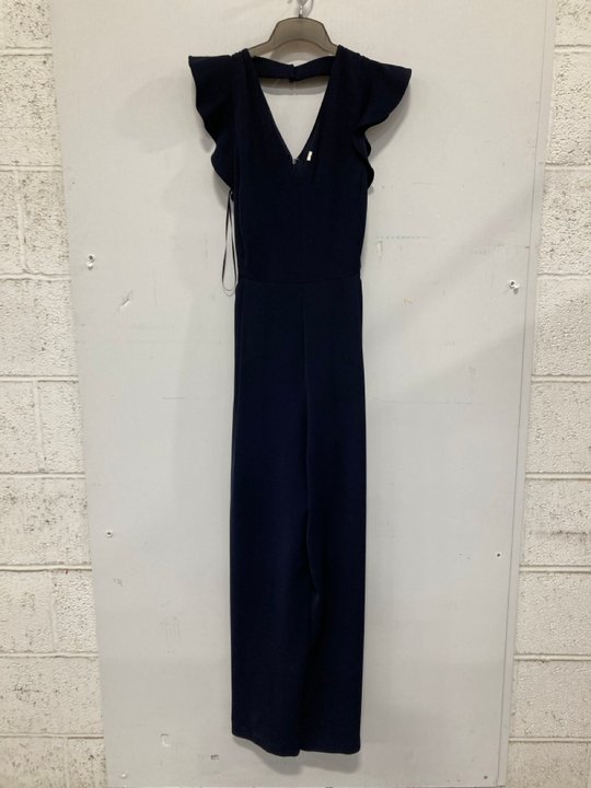 Lot 722  
            Marchington SR14 - Parcel Delivery Only 

                
PHASE EIGHT KALLIE FRILL JUMPSUIT IN NAVY - UK 16 - ORIGINAL RRP £139: LOCATION - B6
