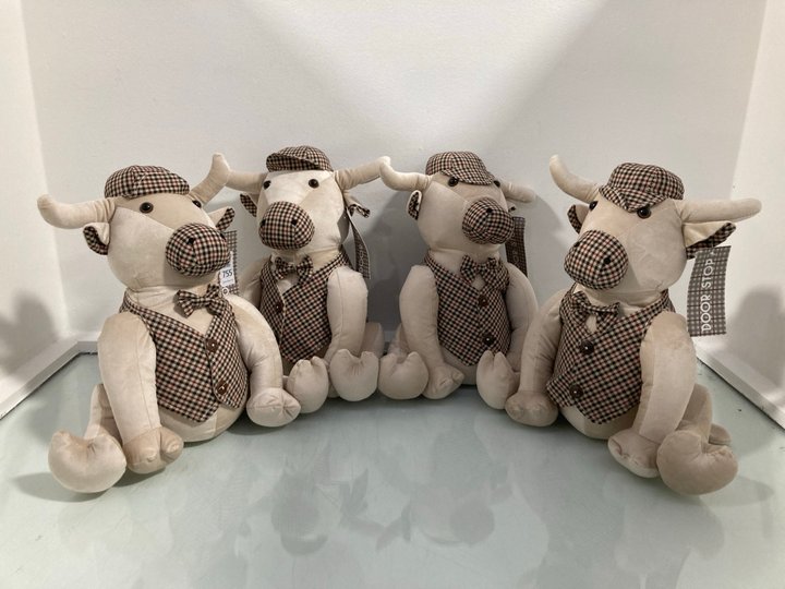 Lot 755  
            Marchington SR14 - Parcel Delivery Only 

                
4 X BUSTER BULL TWEED FABRIC DOOR STOPS: LOCATION - B4