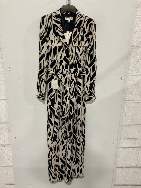 Lot 854  
            Marchington SR14 - Parcel Delivery Only 

                
PHASE EIGHT CONSTANCE GEOMETRIC JUMPSUIT IN BLACK & WHITE - UK 10 - ORIGINAL RRP ...