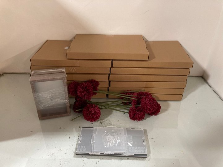Lot 868  
            Marchington SR14 - Parcel Delivery Only 

                
QTY OF ASSORTED ITEMS TO INCLUDE 14 X BOXES OF 12 ARTIFICIAL CHRYSANTHEMUM BALL F...