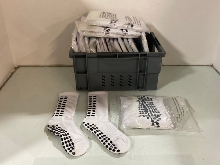 Lot 883  
            Marchington SR14 - Parcel Delivery Only 

                
QTY OF ZUIMEI 3 PAIRS OF SPORTS GRIP SOCKS IN WHITE (SIZE NOT SHOWN): LOCATION - C2