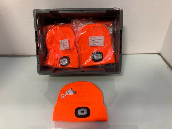 Lot 984  
            Marchington SR14 - Parcel Delivery Only 

                
QTY OF BLUETOOTH RECHARGEABLE LED BEANIES IN ORANGE: LOCATION - C8