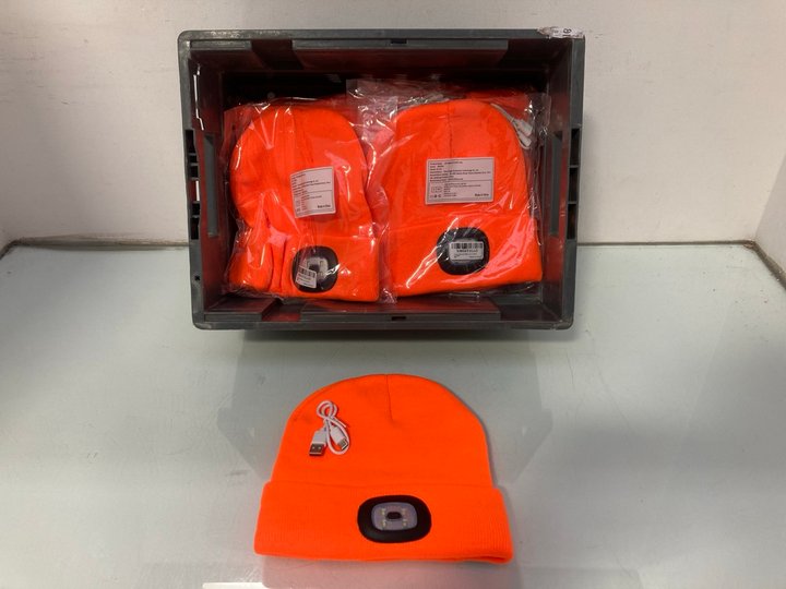 Lot 985  
            Marchington SR14 - Parcel Delivery Only 

                
QTY OF BLUETOOTH RECHARGEABLE LED BEANIES IN ORANGE: LOCATION - C8