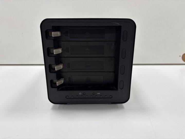 Lot 126  
            Marchington - Parcel Delivery Only 

                
DATA ROBOTICS DROBO 4-BAY FIREWIRE DR04D-D STORAGE ENCLOSURE IN BLACK. (WITH X2 2...