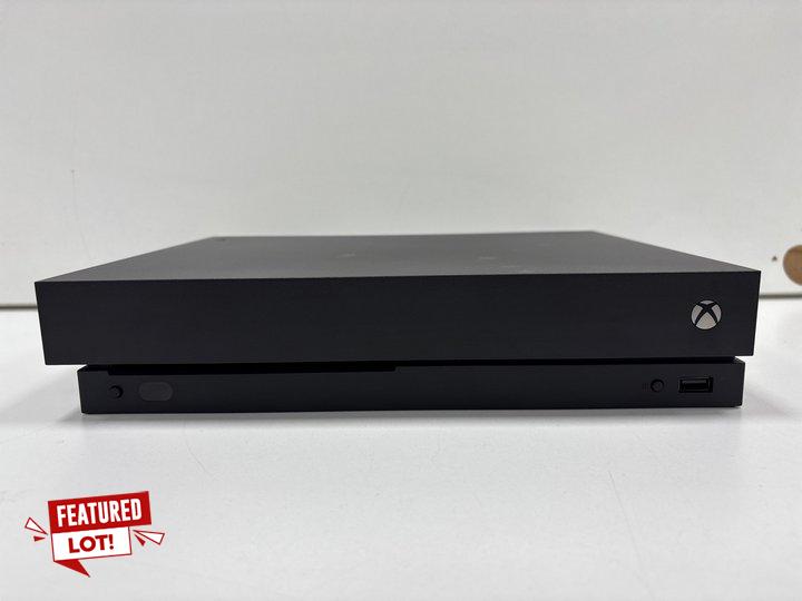 Lot 131  
            Marchington - Parcel Delivery Only 

                
MICROSOFT XBOX ONE X 1TB GAMES CONSOLE IN BLACK: MODEL NO 1787 (WITH POWER CABLE,...