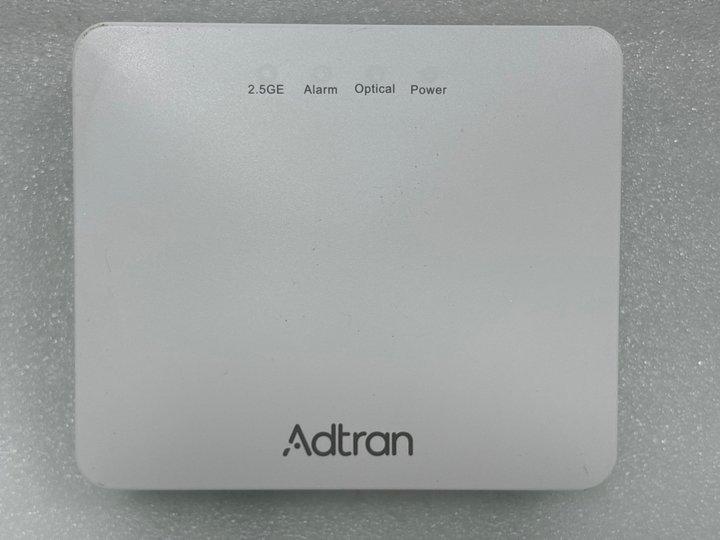 Lot 178  
            Marchington - Parcel Delivery Only 

                
ADTRAN SDX 631Q XGS-PON OPTICAL NETWORK TERMINAL ROUTER IN WHITE. (UNIT WITH PLUG...