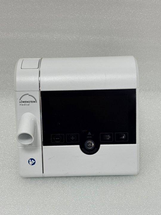 Lot 180  
            Marchington - Parcel Delivery Only 

                
LOWENSTEIN MEDICAL PRISMA SMART MAX APAP MACHINE WM090TD SLEEP APNEA DEVICE (ORIG...