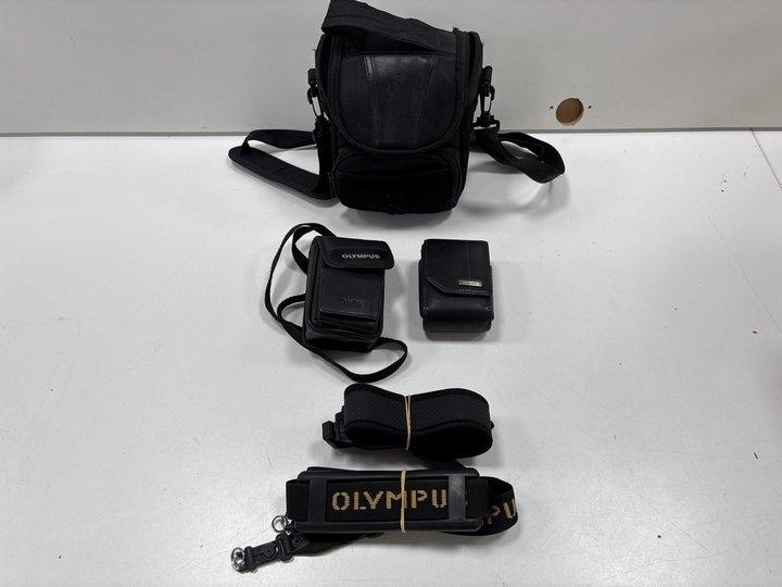 Lot 199  
            Marchington - Parcel Delivery Only 

                
BOX OF ASSORTED ITEMS. (TO INCLUDE - CAMERA BAGS & STRAPS, TABLET/LAPTOP CASES, N...