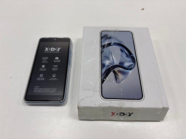 Lot 49  
            Marchington - Parcel Delivery Only 

                
XGODY X32 16GB SMARTPHONE IN BLUE. (WITH BOX AND ACCESSORIES AND PHOTOGRAPHED) [J...