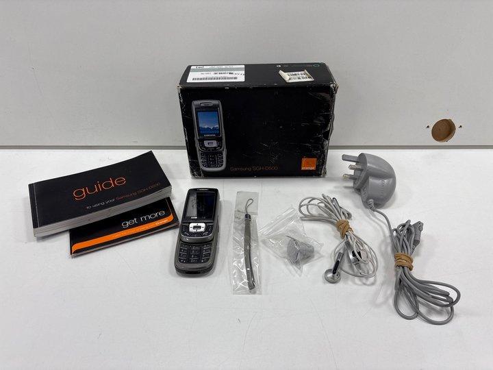 Lot 50  
            Marchington - Parcel Delivery Only 

                
SAMSUNG SGH-D500 MOBILE PHONE IN DARK GRAY. (WITH ORIGINAL BOX & ALL ACCESSORIES)...