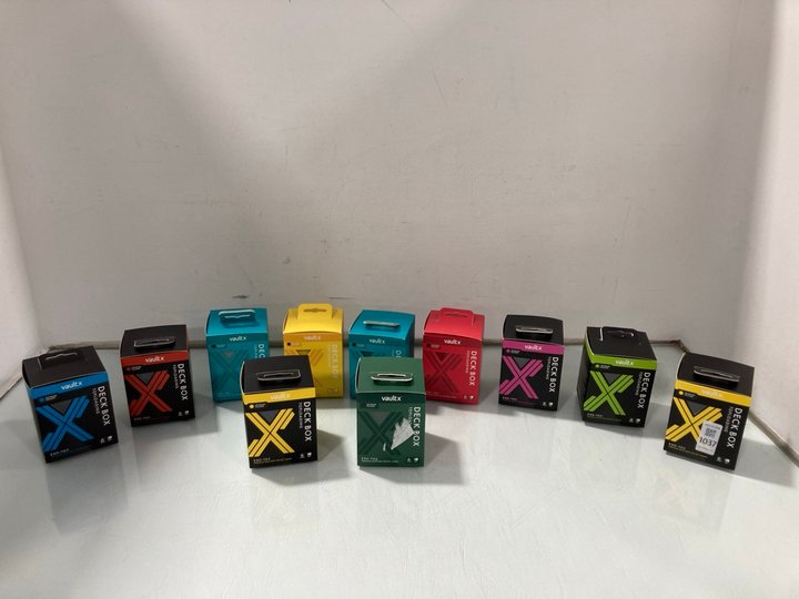 Lot 1037  
            Marchington SR12 - Parcel Delivery Only 

                
QTY OF VAULT X DECK BOX TOP LOADING EXOTEC CARD BOXES IN VARIOUS COLOURS TO INCLU...