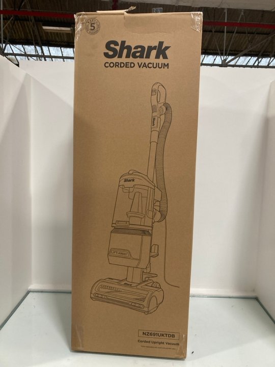 Lot 1125  
            Marchington SR12 - Parcel Delivery Only 

                
SHARK CORDED UPRIGHT VACUUM: LOCATION - E9