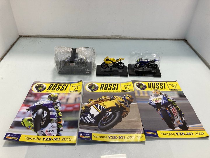 Lot 1242  
            Marchington SR12 - Parcel Delivery Only 

                
3 X MOTORCYCLE MODELS TO ALSO INCLUDE 3 X ROSSI THE BIKE COLLECTION YAMAHA MAGAZI...