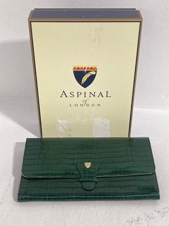 Lot 12  
            Marchington SR12 - Parcel Delivery Only 

                
ASPINAL OF LONDON CLASSIC TRAVEL WALLET IN EVERGREEN CROC EFFECT LEATHER - ORIGIN...