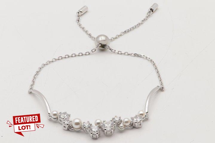 Lot 13  
            Marchington SR12 - Parcel Delivery Only 

                
SWAROVSKI CONSTELLA BANGLE, CRYSTAL PEARL, ROUND CUTS, WHITE RHODIUM PLATED - ORI...