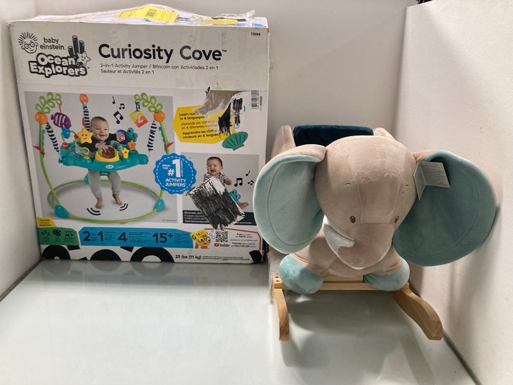 Lot 189  
            Marchington SR12 - Parcel Delivery Only 

                
BABY EINSTEIN CURIOSITY COVE 2 IN 1 ACTIVITY JUMPER TO INCLUDE BABY ELEPHANT ROCK...