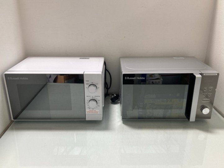 Lot 200  
            Marchington SR12 - Parcel Delivery Only 

                
RUSSELL HOBBS 20L MANUAL MICROWAVE IN WHITE TO INCLUDE RUSSELL HOBBS COMPACT SILV...