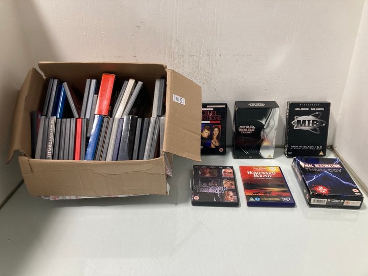 Lot 604  
            Marchington SR12 - Parcel Delivery Only 

                
QTY OF ASSORTED DVDS TO INCLUDE MIB 4 DISC DVD BOX SET (18+ ID REQUIRED): LOCATIO...