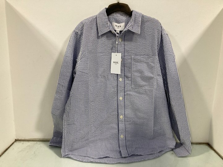 Lot 637  
            Marchington SR12 - Parcel Delivery Only 

                
WAX LONDON ROVE LONG SLEEVE SEERSUCKER TOP IN STRIPE BLUE/WHITE - SIZE: MEDIUM - ...
