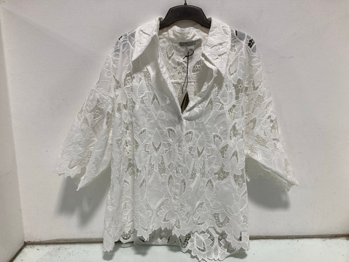 Lot 669  
            Marchington SR12 - Parcel Delivery Only 

                
ALL SAINTS CHARLI EMBROIDERED SHIRT IJN SNOW WHITE - UK SIZE: 12 - ORIGINAL RRP: ...