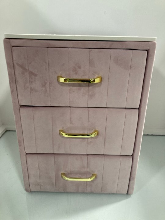 Lot 941  
            Marchington SR12 - Parcel Delivery Only 

                
3 DRAWER MARBLE TOP VELVET BEDSIDE TABLE IN PINK/WHITE: LOCATION - H13