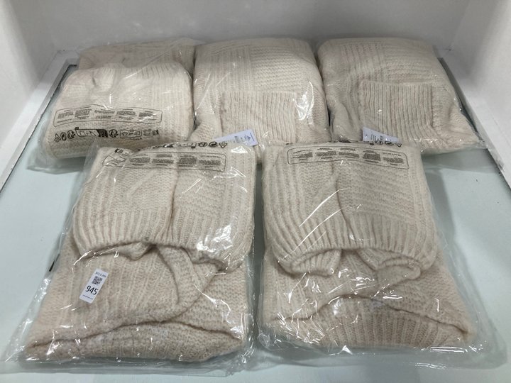 Lot 945  
            Marchington SR12 - Parcel Delivery Only 

                
5 X CERULEAN KNITTED CABLE DETAIL ROLL NECK JUMPERS IN CREAM - UK M/L: LOCATION -...