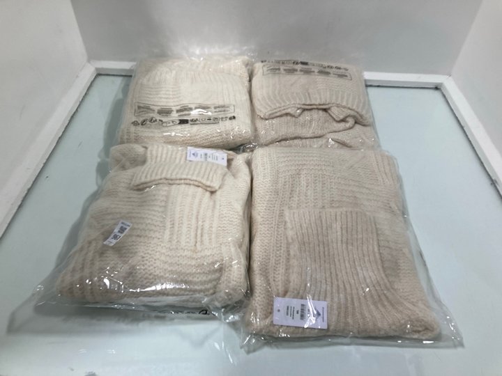 Lot 961  
            Marchington SR12 - Parcel Delivery Only 

                
4 X CERULEAN KNITTED CABLE DETAIL ROLL NECK JUMPERS IN CREAM - UK M/L: LOCATION -...