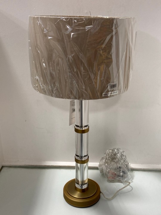 Lot 1002  
            Marchington SR11 - Parcel Delivery Only 

                
AVEBURY TABLE LAMP IN IN ANTIQUE BRASS AND CLEAR CRYSTAL FINISH - ORIGINAL RRP £2...