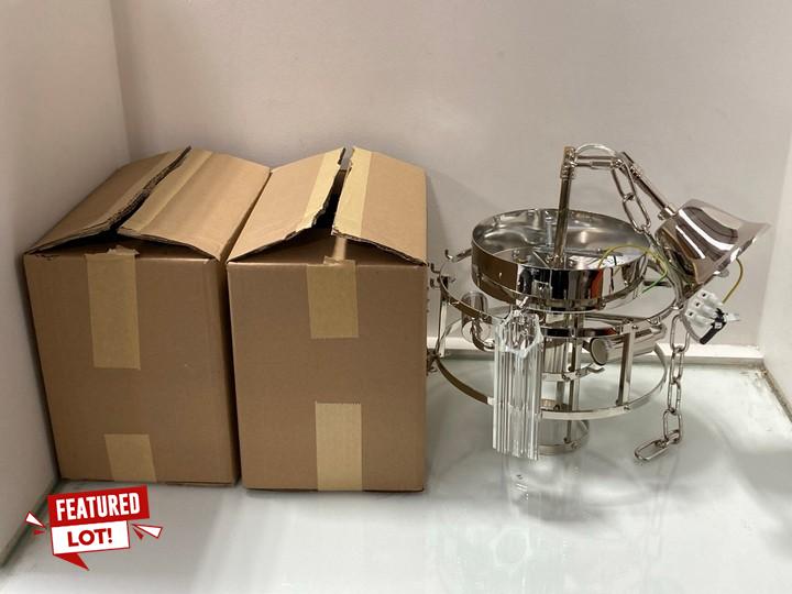 Lot 1005  
            Marchington SR11 - Parcel Delivery Only 

                
NASSER SMALL CHANDELIER CEILING LIGHT IN CLEAR CRYSTAL FINISH - ORIGINAL RRP £345...
