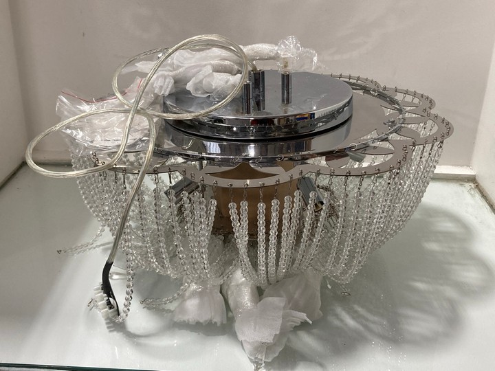 Lot 1012  
            Marchington SR11 - Parcel Delivery Only 

                
MONACO SMALL CEILING CHANDELIER LIGHT IN CHROME AND CRYSTAL FINISH: LOCATION - BR3