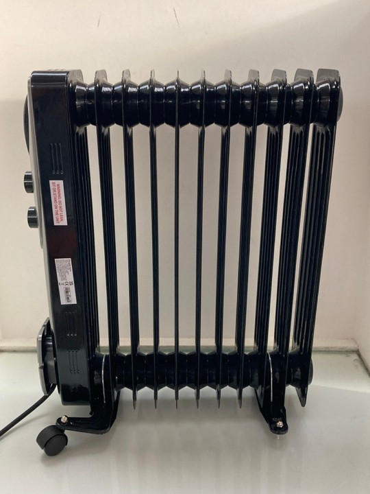 Lot 1135  
            Marchington SR11 - Parcel Delivery Only 

                
RUSSELL HOBBS ELECTRIC RADIATOR IN BLACK: LOCATION - CR8