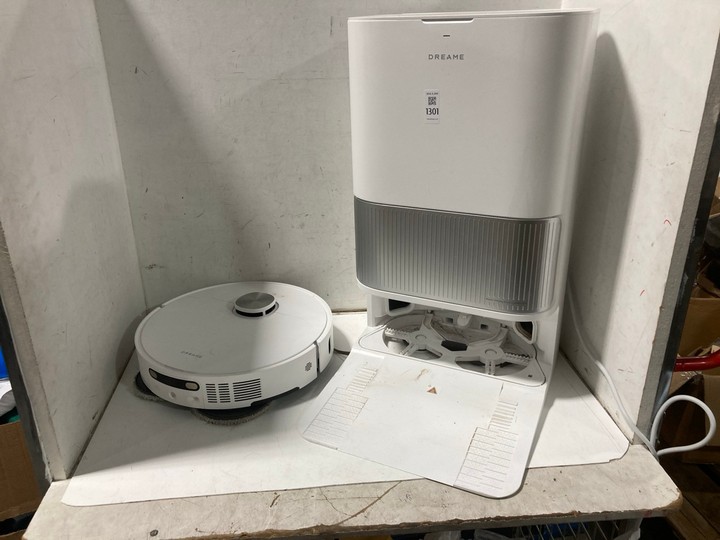 Lot 1301  
            Marchington SR11 - Parcel Delivery Only 

                
DREAME ROBOTIC VACUUM CLEANER WITH BASE STATION IN WHITE: LOCATION - B4