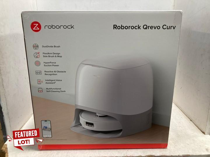 Lot 1354  
            Marchington SR11 - Parcel Delivery Only 

                
RAZORBACK ROBOROCK QREVO CURVE SERIES ROBOTIC VACUUM CLEANER - ORIGINAL RRP £1000...