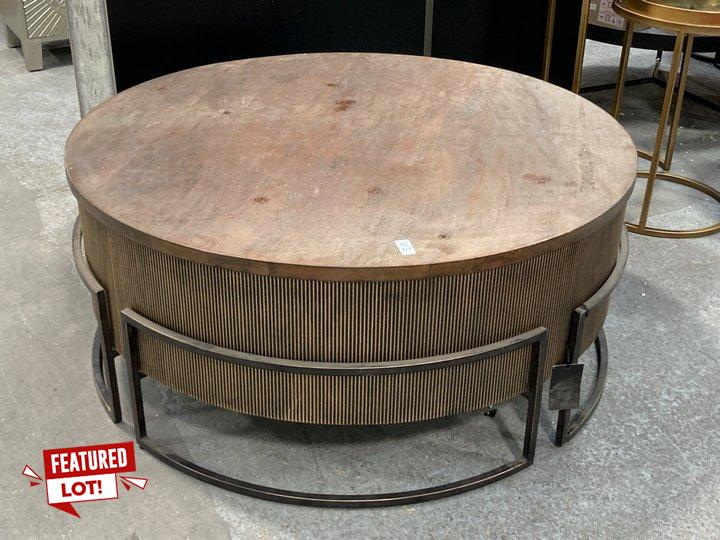 Lot 177  
            Marchington SR11 - Delivery or Collection 

                
HUNTER CORRUGATED ROUND COFFEE TABLE IN NATURAL - ORIGINAL RRP £1250: LOCATION - C3