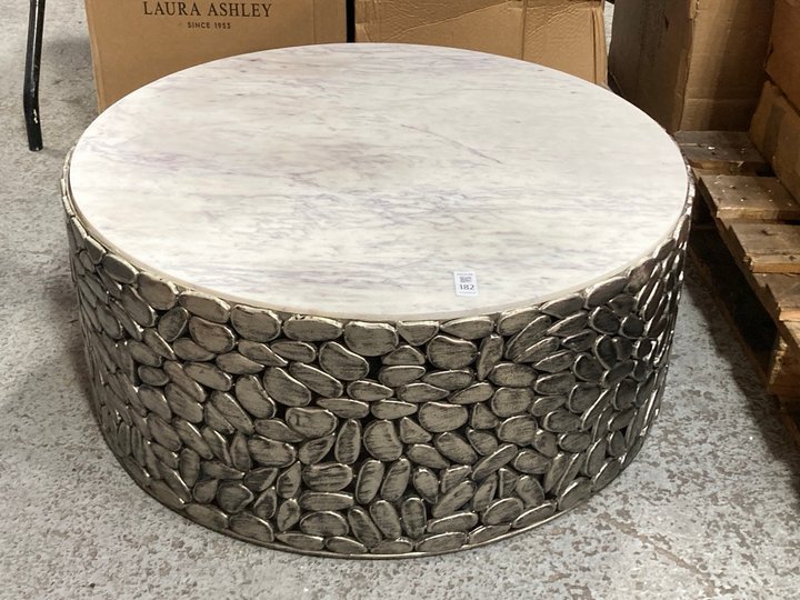 Lot 182  
            Marchington SR11 - Delivery or Collection 

                
MODERN CONTEMPORARY STYLE ROUND COFFEE TABLE IN NICKEL PEBBLE DESIGN WITH WHITE M...