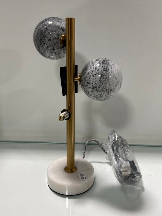 Lot 189  
            Marchington SR11 - Collection 

                
(COLLECTION ONLY) CONSTELLATION TABLE LAMP IN BRASS AND WHITE MARBLE WITH MARBLE ...