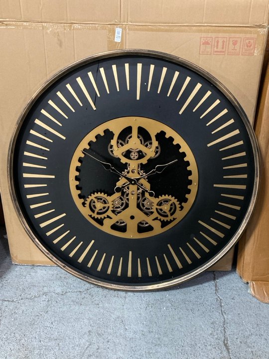 Lot 229  
            Marchington SR11 - Delivery or Collection 

                
LARGE ROUND OPEN COG STATEMENT WALL CLOCK IN BLACK AND ANTIQUE BRASS FINISH: LOCA...