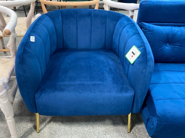 Lot 268  
            Marchington SR11 - Delivery or Collection 

                
DREAMS INTERIORS SHELL STYLE ACCENT ARMCHAIR IN DEEP BLUE PLUSH VELVET AND POLISH...