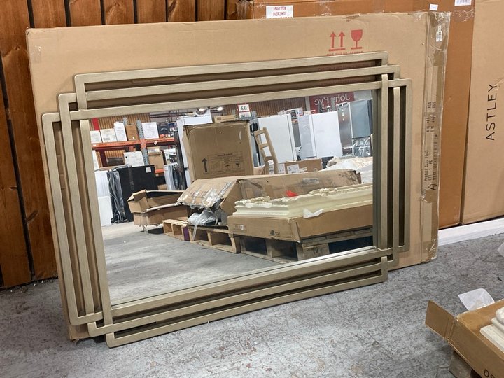 Lot 390  
            Marchington SR11 - Delivery or Collection 

                
OSWIN MIRROR IN CHAMPAGNE SILVER: LOCATION - A2W