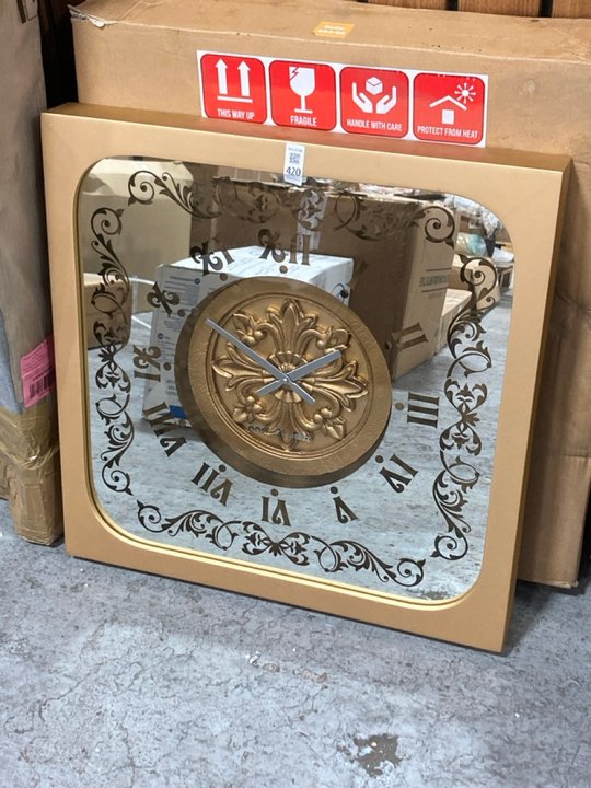 Lot 420  
            Marchington SR11 - Delivery or Collection 

                
ONN STUDIO 60CM SQUARE DECORATIVE WALL CLOCK IN GOLD EFFECT: LOCATION - A6W