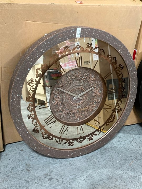 Lot 421  
            Marchington SR11 - Delivery or Collection 

                
ONN STUDIO 75CM ROUND DECORATIVE WALL CLOCK IN BRONZE EFFECT: LOCATION - A6W