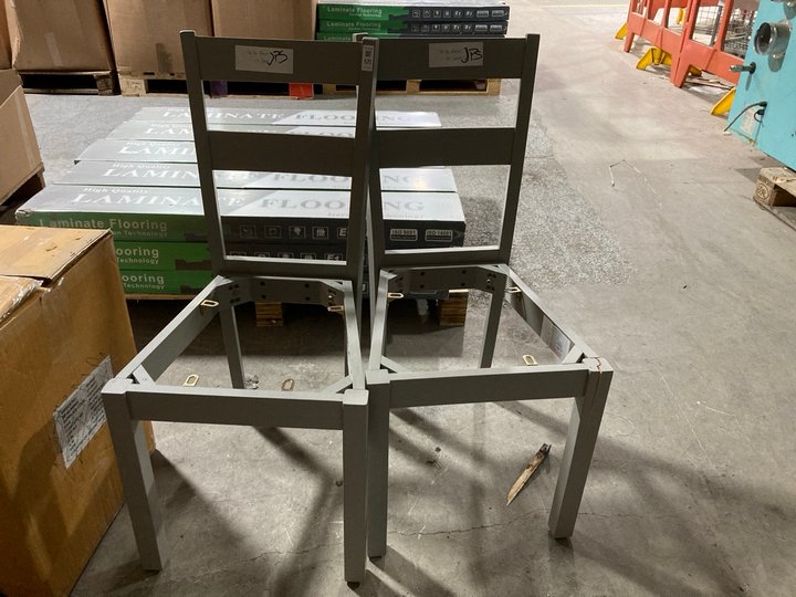 Lot 571  
            Marchington SR11 - Delivery or Collection 

                
PAIR OF SLATTED BACK DINING CHAIR FRAMES IN GREY: LOCATION - A1