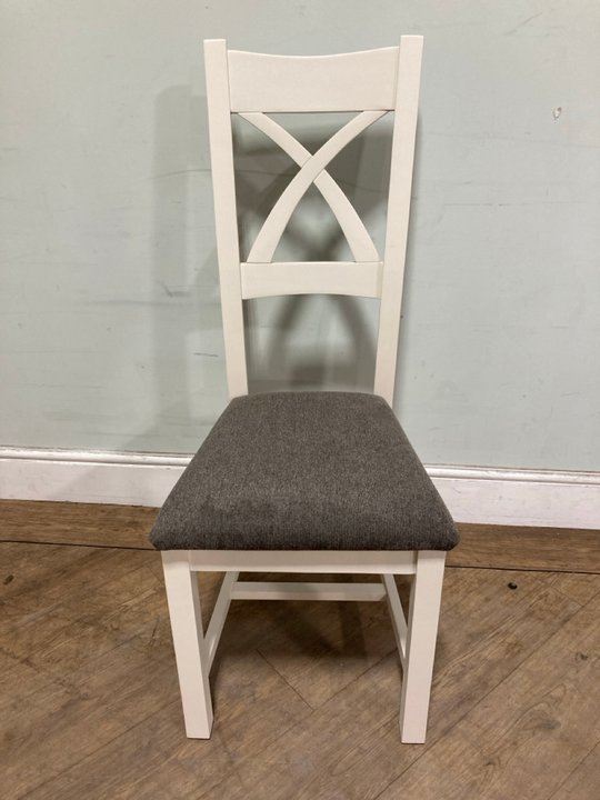 Lot 585  
            Marchington SR11 - Delivery or Collection 

                
X CROSS CHAIR - SOFT WHITE PAINTED WITH CHARCOAL PADS - PAIRS - ORIGINAL RRP £480...