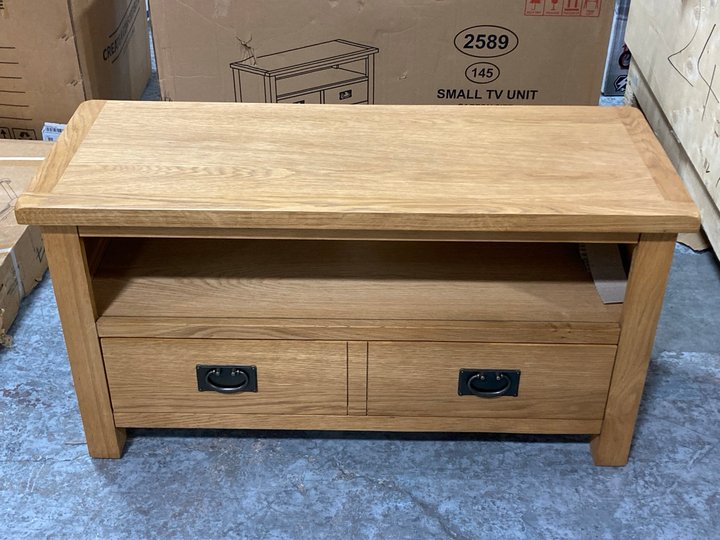 Lot 699  
            Marchington SR11 - Delivery or Collection 

                
2 DRAWER SMALL TV UNIT IN OAK: LOCATION - A6